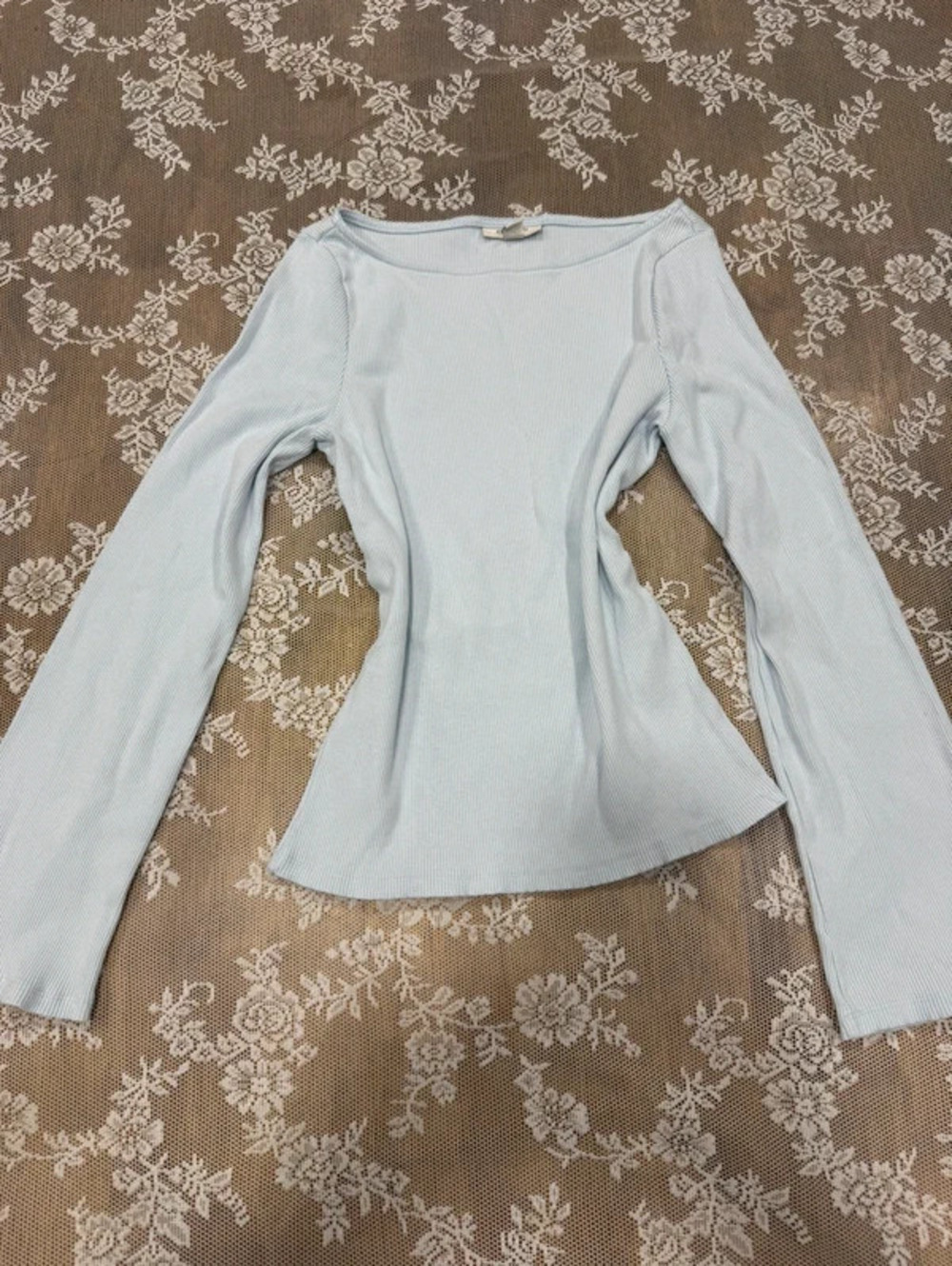 baby blue blouse with flared sleeves